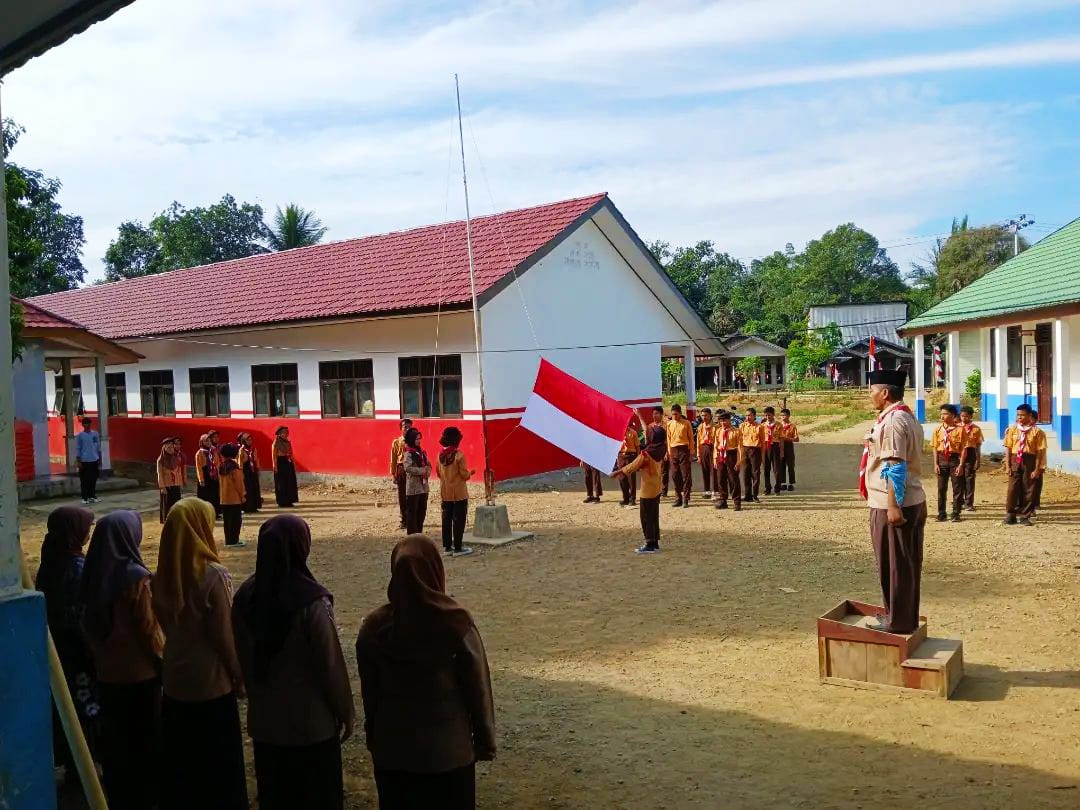 Upacara Hari Pramuka Ke-63 Tahun di SMP Negeri 9 Muara Uya
